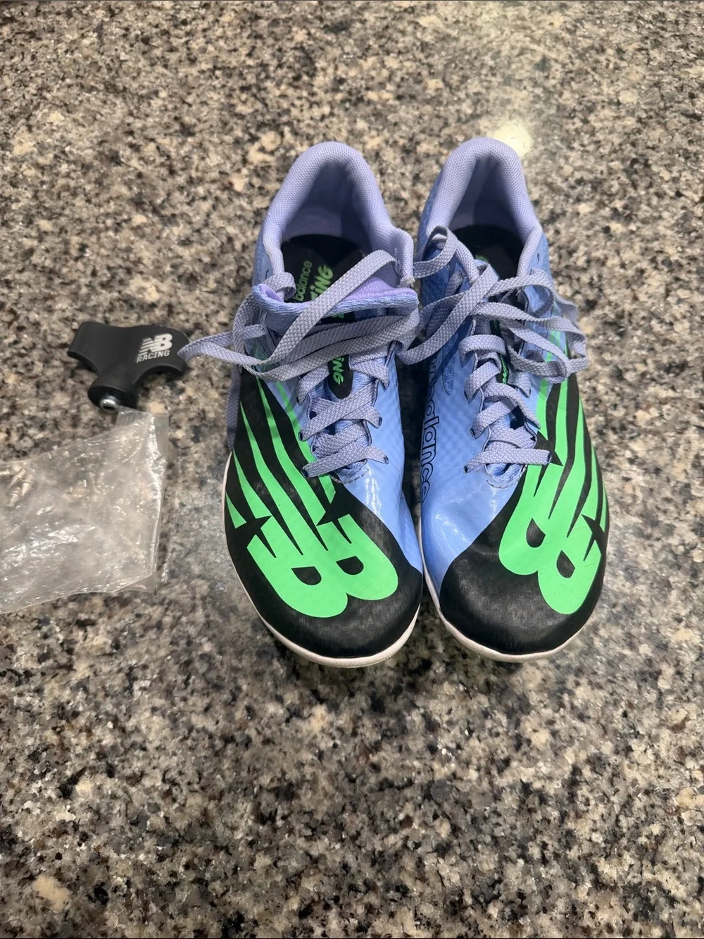 New Balance running spikes with Bright Green Logo